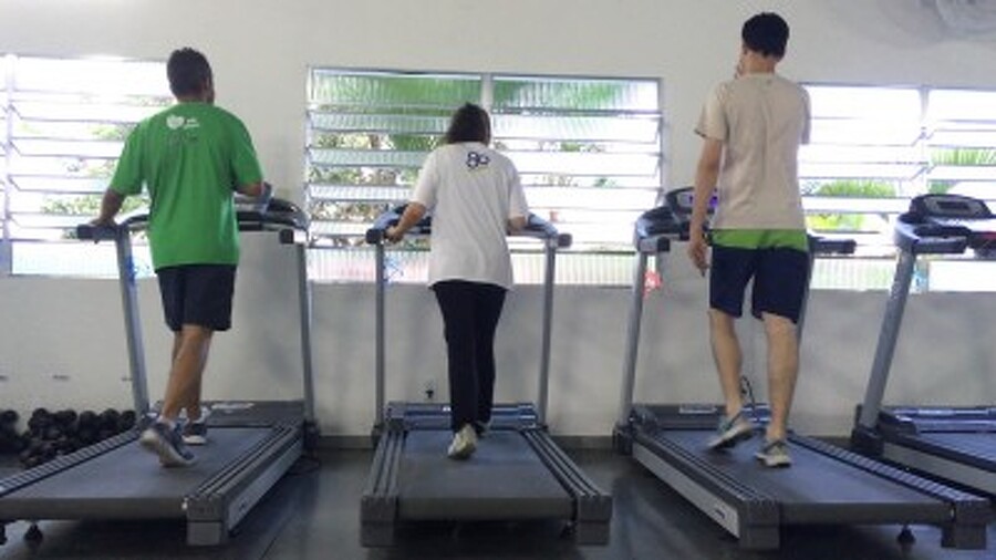 3 people Walking on Treadmills